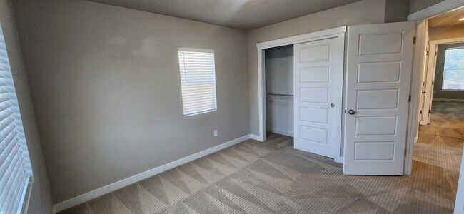 Building Photo - $2,000 OFF 4-bed, 3.5-bath Townhome Available Now!