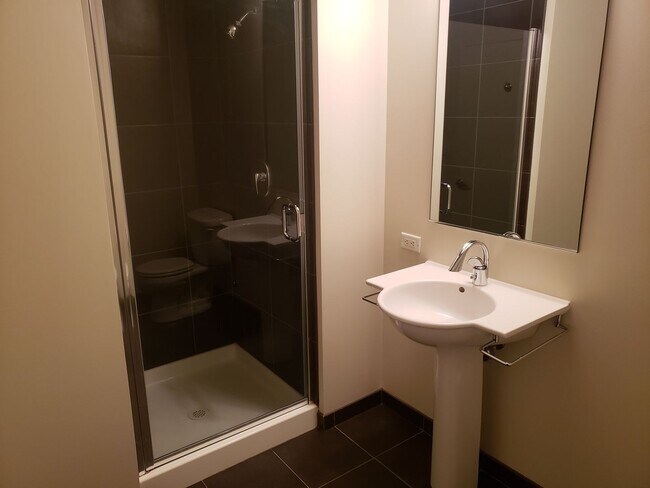 Building Photo - Wonderful Two story Penthouse Condo! Water...