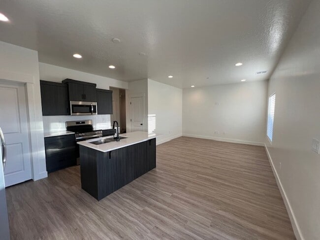 Building Photo - BRAND NEW South Desert Townhome with EVSE Outlet