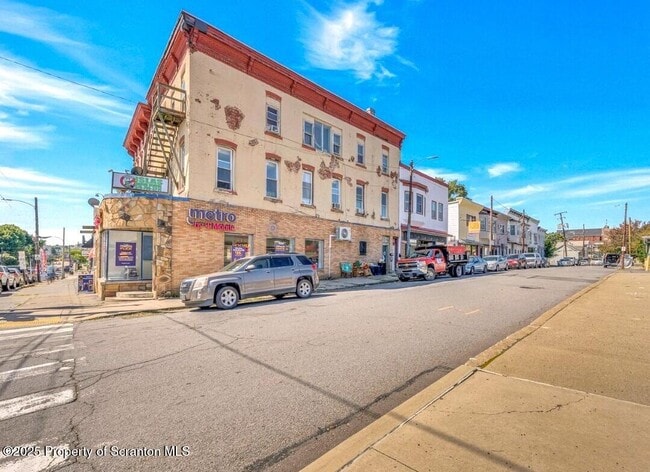 Building Photo - 104-104 S Main Ave