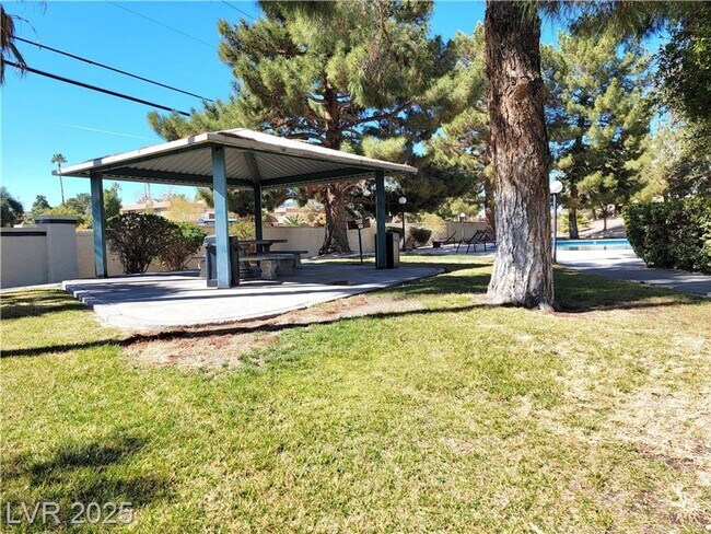 Building Photo - Inviting Green Valley Condo with Dual Balc...
