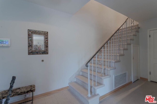 Building Photo - 10959 Strathmore Dr