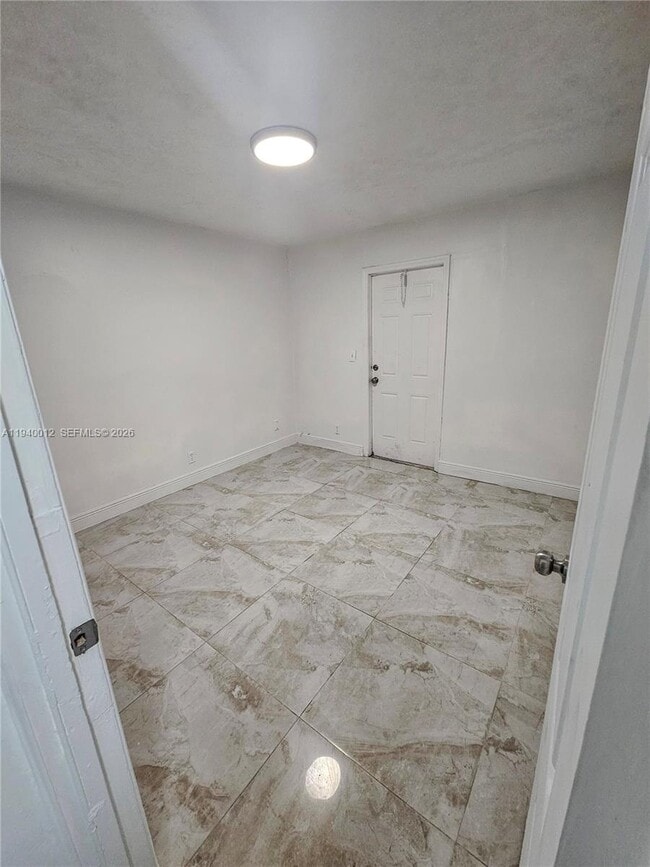 Building Photo - 5615 NW 27th Ct