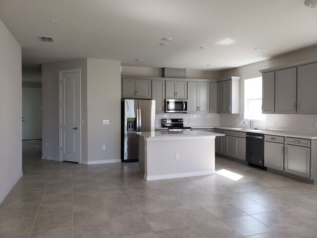 Building Photo - Spacious 3-Bedroom Home for Rent in Gated Cagan Crossings Community!