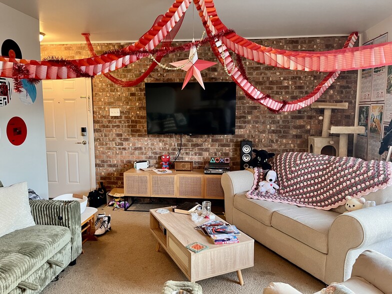 Living room view from dining room. - 305 Green Briar St