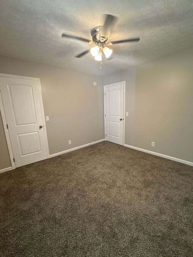 Building Photo - Charming Home with Covered Back Deck and Fenced in Yard...