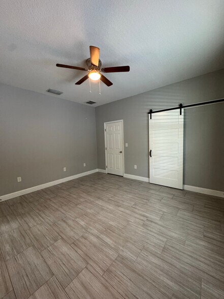 Building Photo - 6412 S Adelia Ave