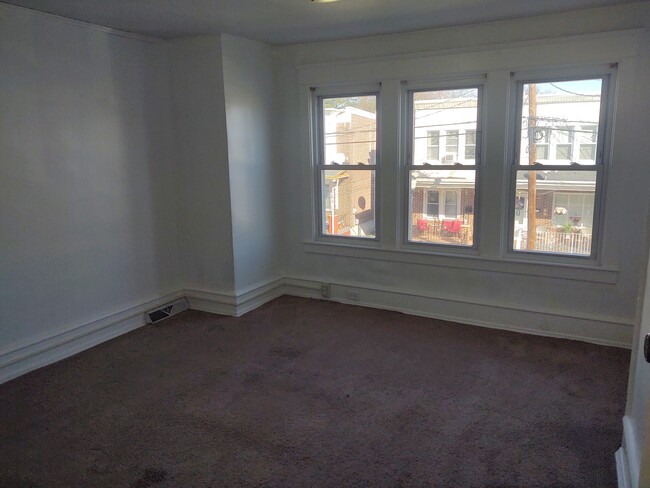 Large Primary Bedroom, equipment with dedicated AC window unit outlet. - 223 Cedar Ave