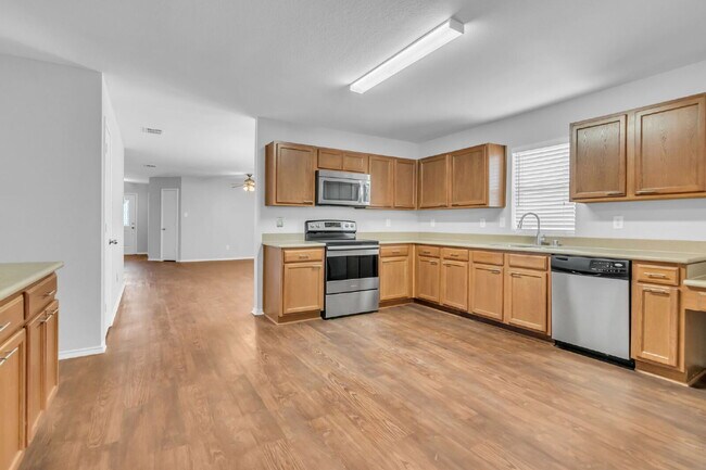 Building Photo - "Spacious 4-Bedroom Home – 2,085 Sq Ft For...