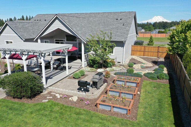 Building Photo - Luxury Yelm Estate on ¾ Acre with Custom Outdoor Living, Loft, A/C & Designer Kitchen!