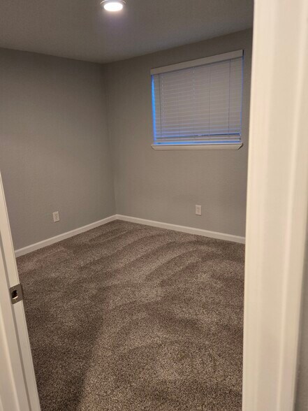 Bsmt bdrm w/egress and walkin closet - 8731 Field Way