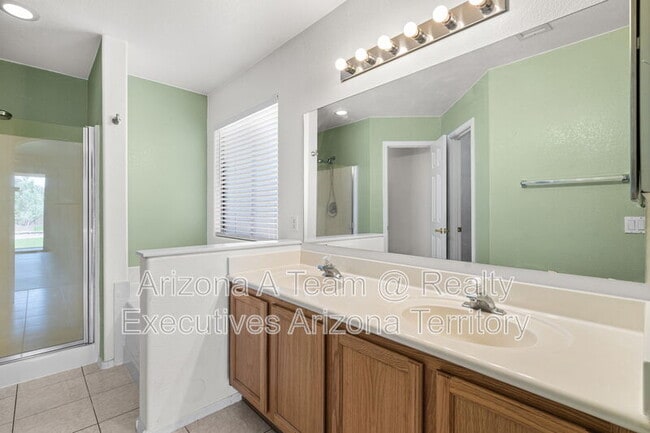 Building Photo - 8969 E Martha Root Ct