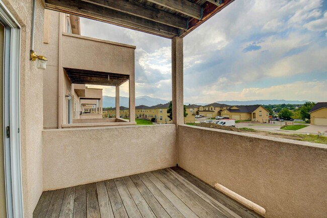 Building Photo - Updated Townhome Near Fort Carson with Unm...