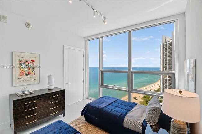 Building Photo - 18501 Collins Ave