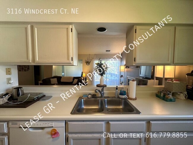 Building Photo - Two Bedroom Condo in Forest Hills Schools ...