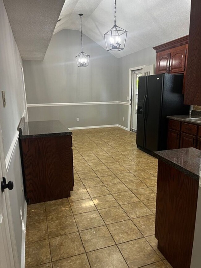 Building Photo - Charming All-Brick Corner Lot Home with Hot Tub & Fenced Yard