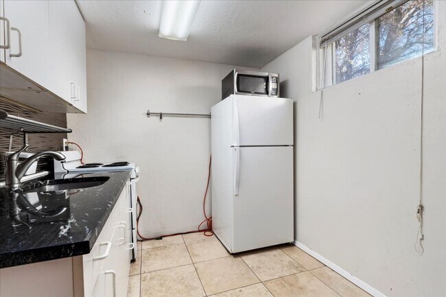 Building Photo - Javid Properties Triplex