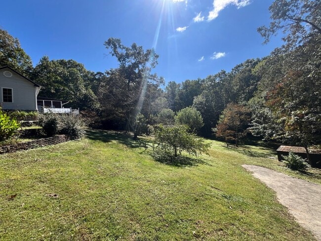 Building Photo - $1500 — 2 BEDROOM 1 BATH — Off Howard Gap Rd
