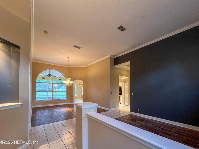 Building Photo - 1704 Tall Tree Dr E