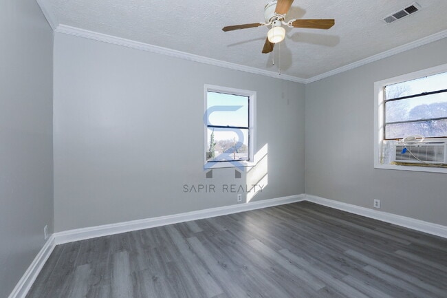 Building Photo - Move in before December 31st and choose your reward: a $250 Amazon Gift Card or a 55" Smart TV!