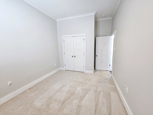 Building Photo - Stunning 4-Bedroom Waterfront Home with Granite Countertops and Hardwood Floors in The Sanctuary ...