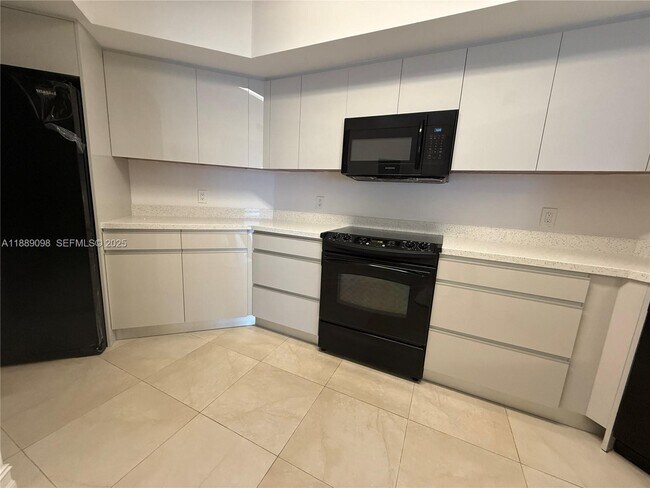 Building Photo - 16699 Collins Ave