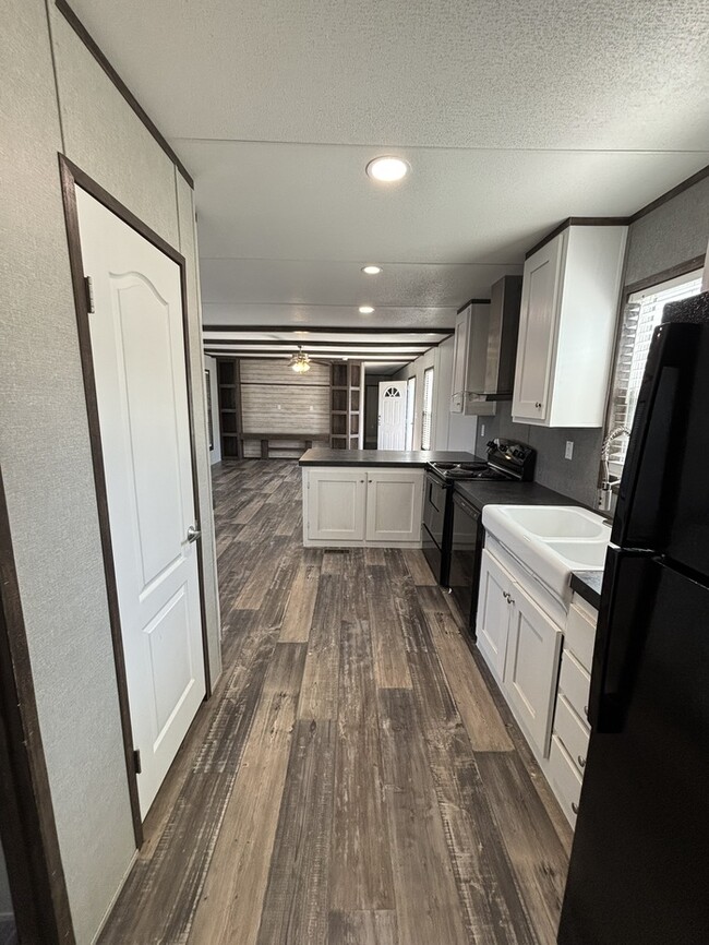 Building Photo - Triangle Mobile Home Park