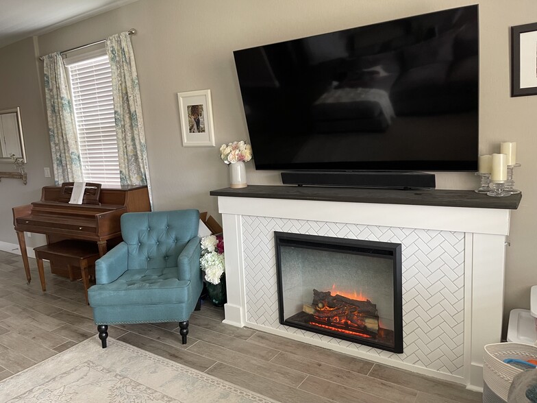 Electric fireplace (with heat) added in 2022 - 10647 Marble Arch St