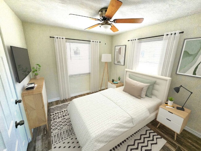 Building Photo - fully renovated 2-bedroom, 1-bathroom home with bonus guest room or office and oversized fenced yard