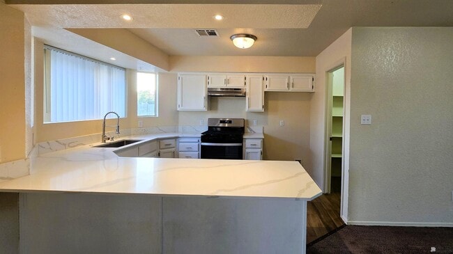 Building Photo - 8573 E 25th St