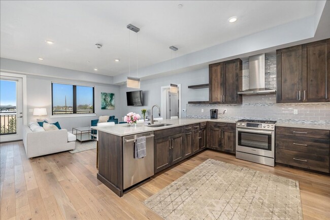 Building Photo - COME HOME TO REFINED DOWNTOWN LUXURY CONDO...