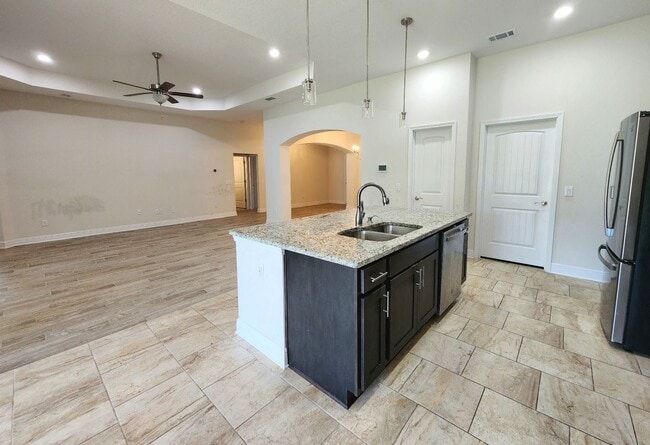 Building Photo - Welcome to this stunning 4-bedroom, 3-bath...