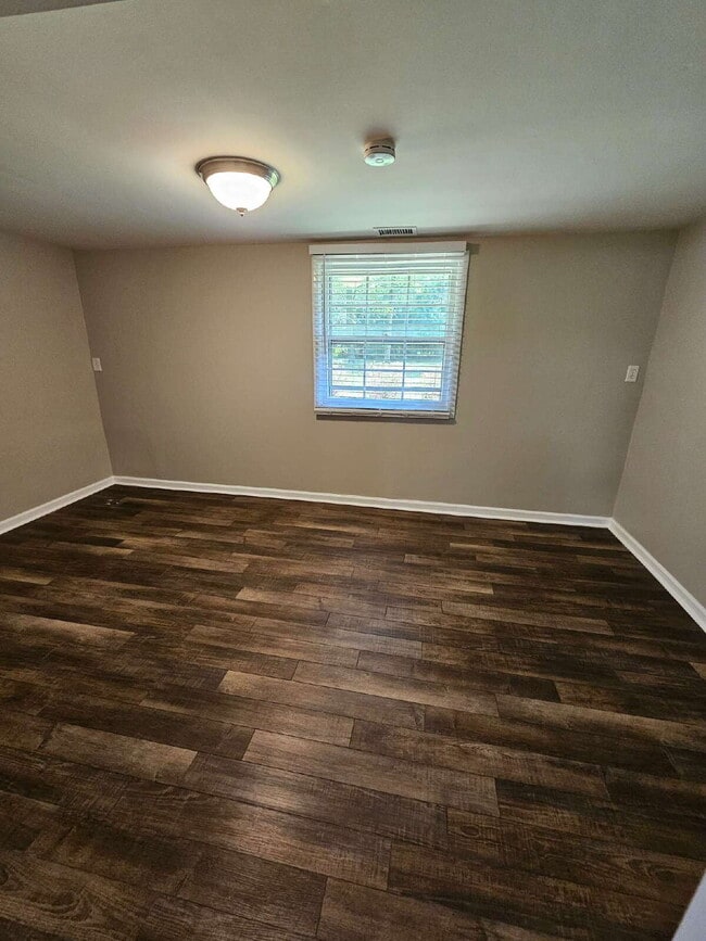 Building Photo - Private 4 Bedroom Home on 0.75 Acres with Great Room Fireplace, Wet Bar & 3-Season Room, 2 Car At...