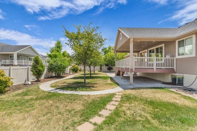 Building Photo - Spacious Syracuse Home with Covered Deck, Loft & Oversized 3-Car Garage