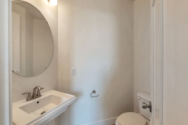 Building Photo - Modern Row End Townhome w 2 car attached g...