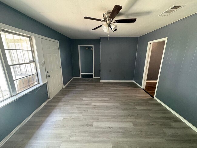 Building Photo - Large 3 bedroom, 2 bath with refrigerator!