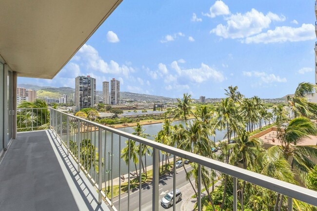 Building Photo - Waikiki 1BR/1BA with Ala Wai Canal & Mountain Views — Wraparound Lanai, Utilities Included