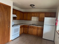 Building Photo - 1000 Wild Rose Ln