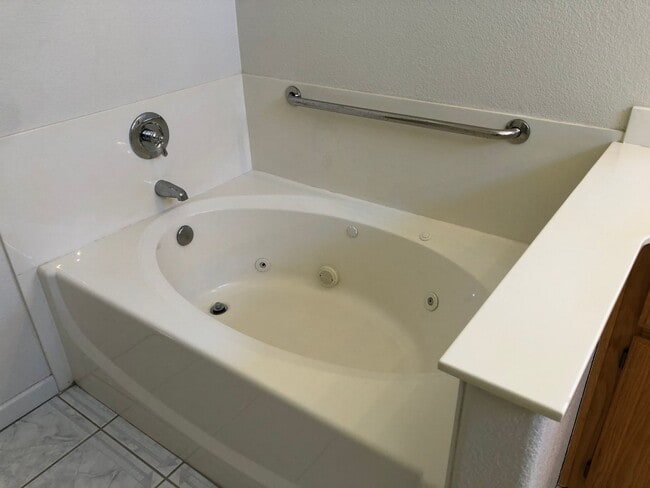 Building Photo - Cute one story in a 55 or better gated community.