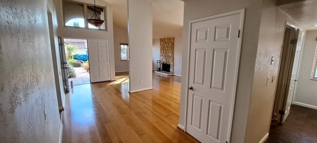 refinished hardwood floor in family and dining room, new paint - 5966 Quiet Slope Dr