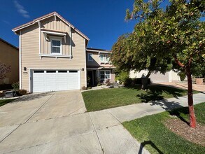 Building Photo - Short Term Lease - Grand 4-Bedroom Home with Entertainer's Yard in Gated River Village!