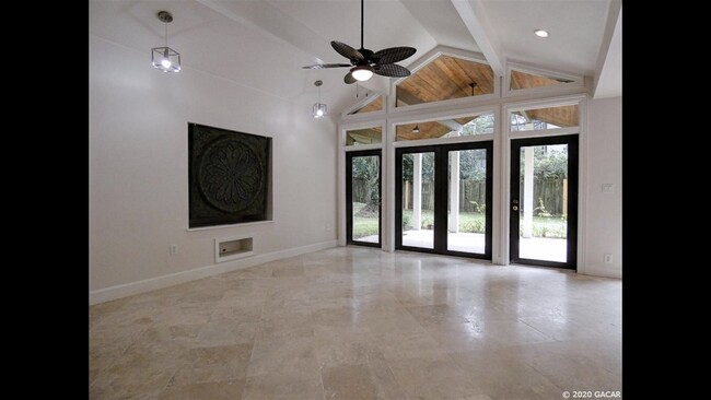 Living room with doors to backyard - 1637 NW 7th Ave