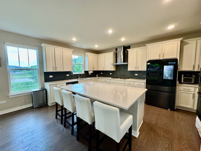 Building Photo - Newly Built 5-bedroom featuring luxe finishes and a spa-inspired master suite.