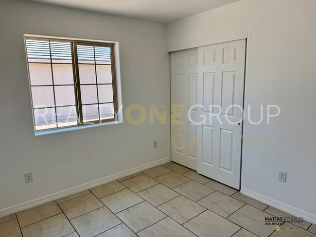 Building Photo - Three Bedroom Two Bath Home with All Tile ...