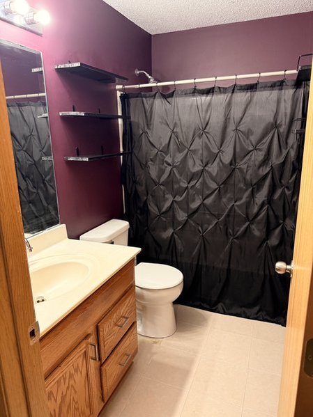 Full bath upstairs - 7013 Quantrelle Ave NE