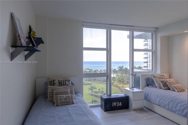 Building Photo - 10275 Collins Ave