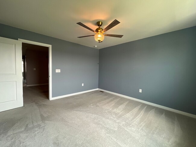 Building Photo - Move-in-ready Brookside Court townhome off...