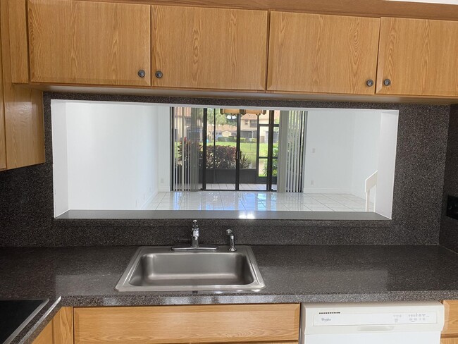 Building Photo - 3961 Cocoplum Cir