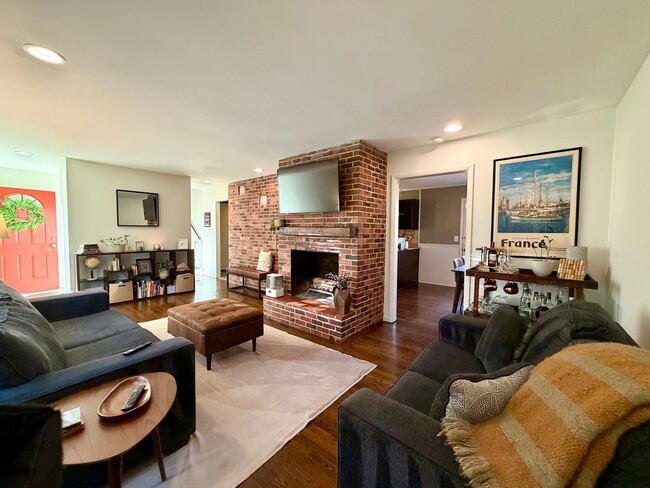 Building Photo - {7710} Prairie Village Split Level with Two Car Garage + Two Full Bathrooms + Hardwood Floors + U...