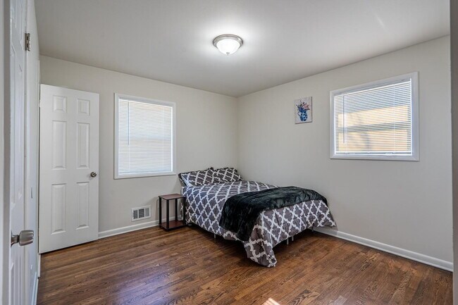 Building Photo - The Forest Haven | Large Forest Haven home with a spacious yard and deck, conveniently located ju...